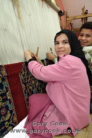 Children at work making carpets, government sponsored school / carpet factory, near Saqqara, Egypt