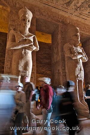 Statues of Ramses II dominate the large pillared hall, Abu Simbel, Egypt