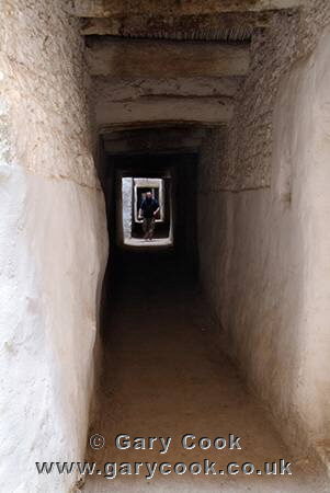 Tourist exploring the narrow alleyways in the Old Town, Ghadames, Libya