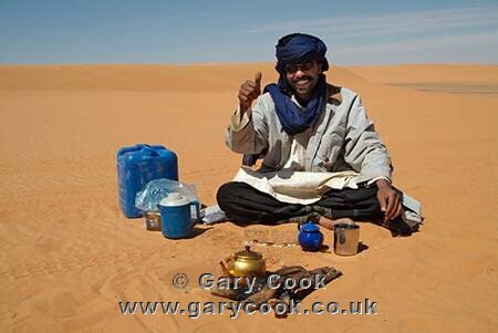 Tuareg man making tea, Sahara Desert, Libya