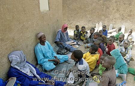 Koranic school in the shade of the Grand Friday Mosque, Djenne, Mali