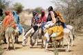 Mauritainian women on donkeys in the Sahel, Mauritania