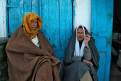 Berber men sitting on the doorstep, Kairouan, Tunisia