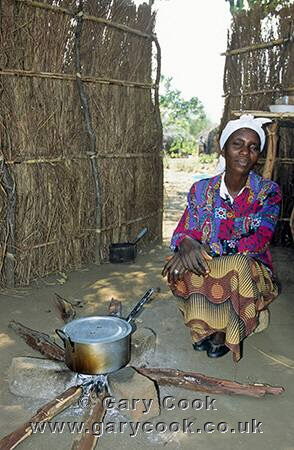 Zambian woman cooking lunch, Kawaya Village Community Project, Zambia