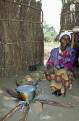 Zambian woman cooking lunch, Kawaya Village Community Project, Zambia