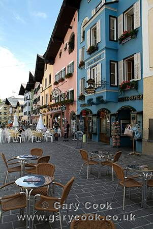 Street cafe and colourful houses, Kitzbuhel, Austria