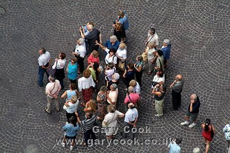 Tourists on a guided tour of Innsbruck, Austria