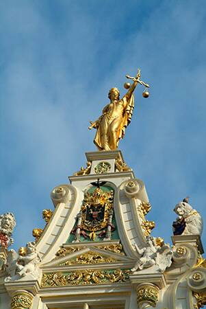 Statue of Justice, on top of the Oude Griffie, Old Recorders House, Burg square, Bruges, Brugge, Belgium