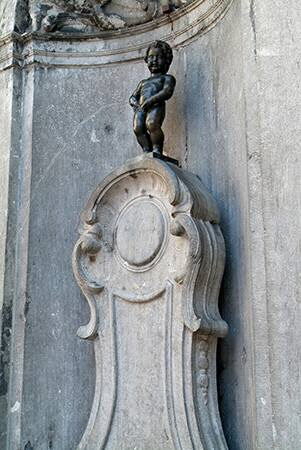 The Manneken-Pis, bronze statue, symbol of Brussels, by Jerome Durquesnoy, Brussels, Bruxelles, Belgium