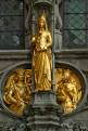 Golden figures decorate the exterior of the Heilig Bloedbasiliek, Basilica of the Holy Blood, Burg square, Bruges, Brugge, Belgium