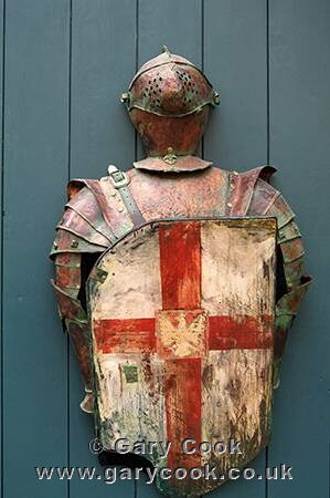 St George Cross and knight armour, tourist souvinier shop, Tallinn, Estonia