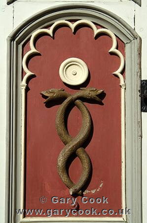 Door carvings on the Pharmacy (Raeapteek) in Town Hall square (Raekoja Plats), Tallinn, Estonia
