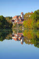 St Mang Monastery and Basilica reflected in the river Lech, Fussen, Bavaria, Germany