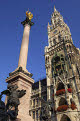 Statue of the Virgin Mary and the Neues Rathaus, Marienplatz, Munich, Bavaria, Germany
