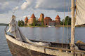 Traditional boat and Trakai Castle, Trakai, near Vilnius, Lithuania