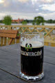 Vilkmerges, Lithuanian dark beer, with Trakai Castle in the background, Lithuania