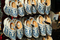 Clogs for sale painted in Delft Blue style, Delft, Holland, The Netherlands