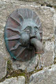 Drinking water fountain shaped in the face of the sun, Kirkcudbright, Dumfries and Galloway, Scotland