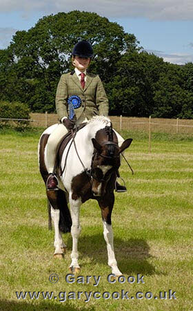 Mrs MacKay presents the Senior Champion Trophy to Kate MacDonald on Lady Uleta with runner up Tabitha Briggs on Little Miss Muffet, Gatehouse Gala Horse and Pony Show 2008