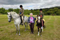 Mrs MacKay presents the Junior Champion Trophy to Robyn Bendall on Chantilly Lace with runner up Emily Gladstone on Miami Merlin, Gatehouse Gala Horse and Pony Show 2008