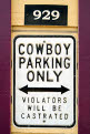 Humourous roadside sign - Cowboy Parking Only, Violators Will be Castrated, Dawson City, Yukon, Canada