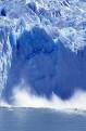 An iceberg calves off Moreno Glacier, Parque Nacional Los Glaciares, Patagonia, Argentina