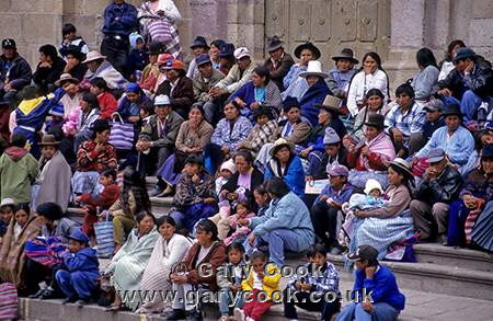 Locals watching the Festival, outside the  Cathedral, Potosi, Bolivia