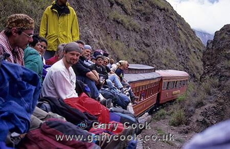 Tourists on the roof of the train, Devils Nose Train Ride, Alausi, Ecuador