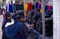 Indian women shopping for hats, Ingapirca market, Ecuador