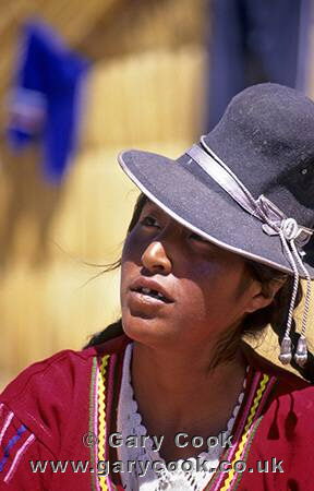 Uros Indian woman on the reed islands, Lake Titicaca, Peru