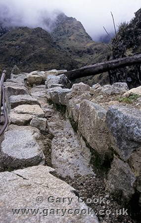 Inca stonework - aquaduct, Sayacmarka Inca Ruins, Inca Trail, Peru
