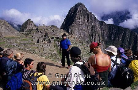 Tourists on a guided walk around Machu Picchu, Peru