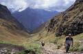 Tourist reaching the summit of Dead Womans Pass, Inca Trail, Peru