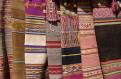 Traditional rugs for sale, craft market, Aguas Calientes, Peru